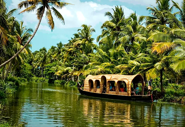 Traditional houseboat on palm-fringed Kerala backwaters